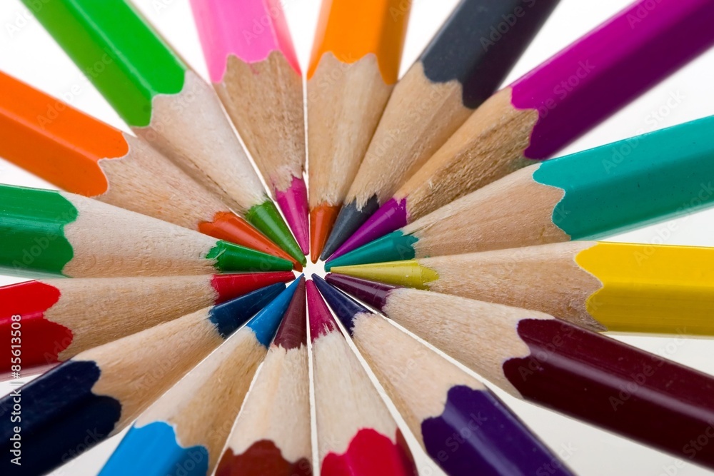 Fototapeta premium thick colored pencils against a white background color