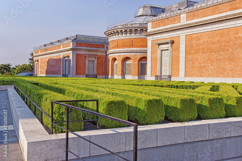 Small green park and Prado Museum in Madrid