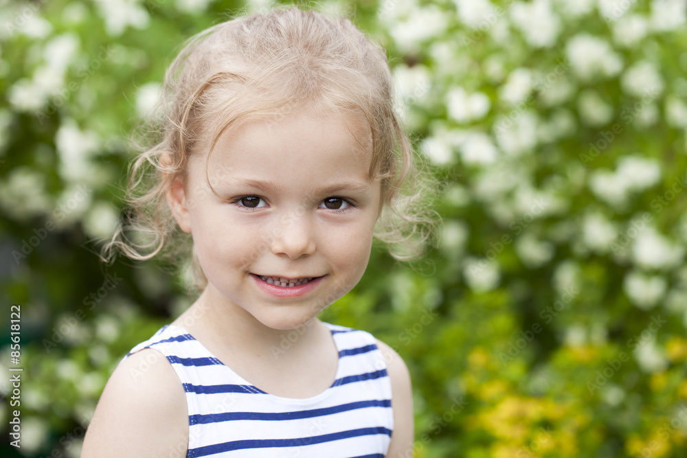 Close up portrait of a six year little girl, against background Close up portrait of a six year little girl, against background