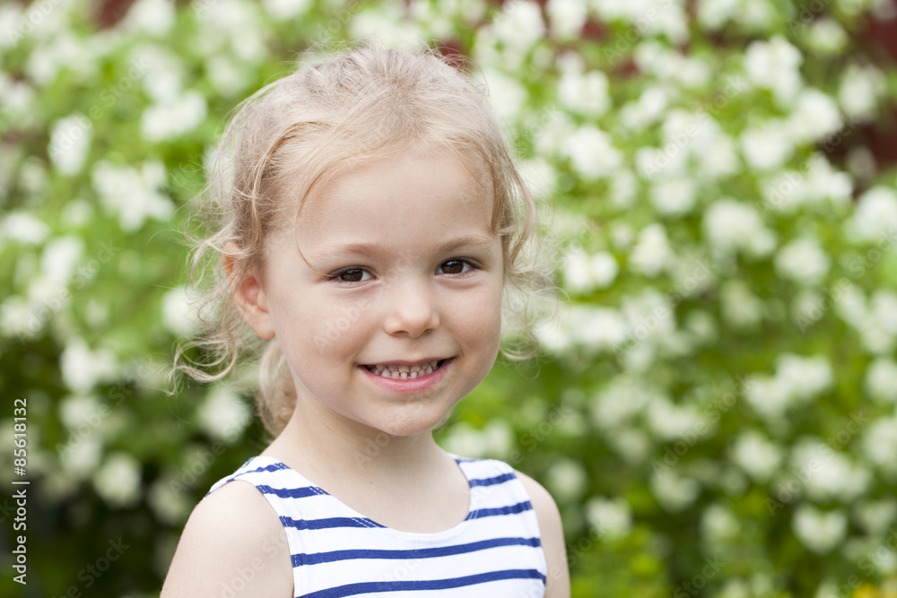 Close up portrait of a six year little girl, against background Close up portrait of a six year little girl, against background