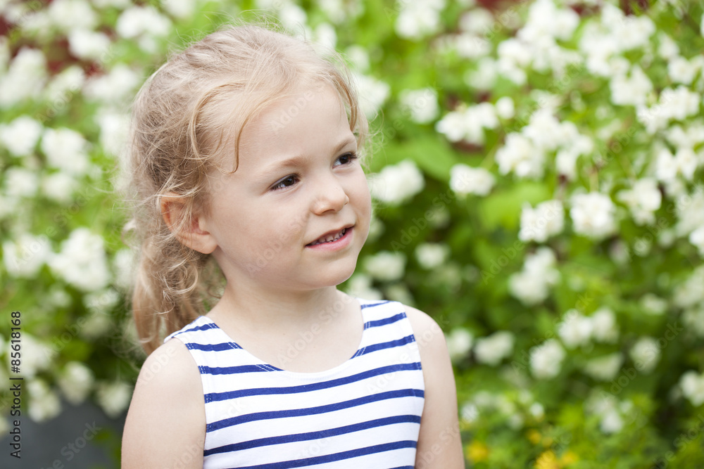 Close up portrait of a six year little girl, against background Close up portrait of a six year little girl, against background