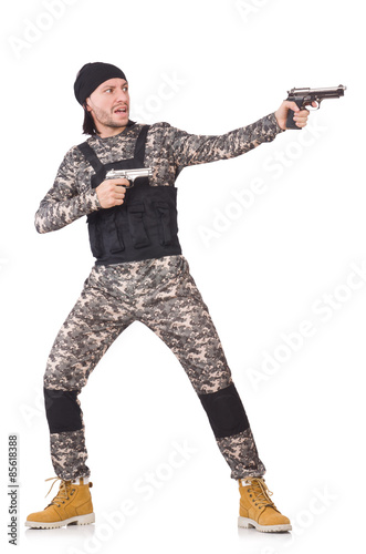 Young man in military uniform holding pistol isolated on white © Elnur