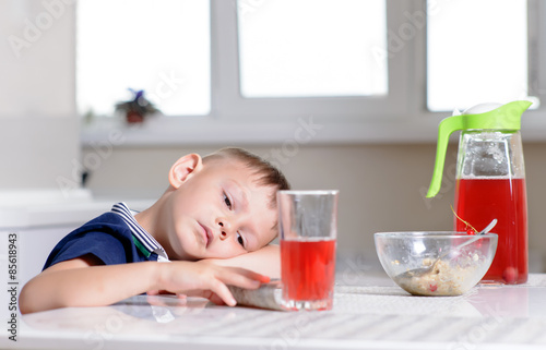 Young boy waiting patiently for his lunch