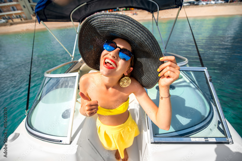 Woman having fun on the yacht