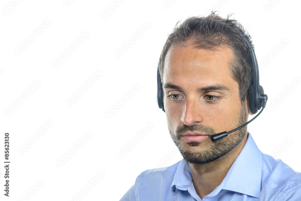 Handsome customer service operator wearing a headset Handsome customer service operator wearing a headset