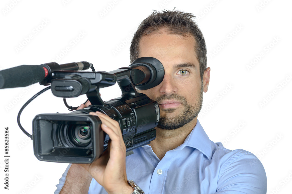 a young man with professional movie camera a young man with professional movie camera