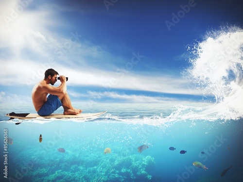 Surfer waiting for the wave © alphaspirit