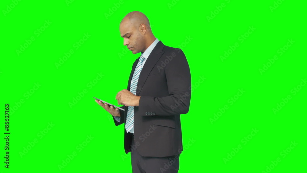 Businessman using his tablet pc Businessman using his tablet pc