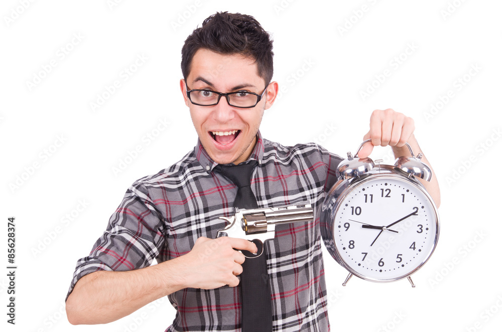 Employee holding alarm clock and weapon isolated on white Employee holding alarm clock and weapon isolated on white