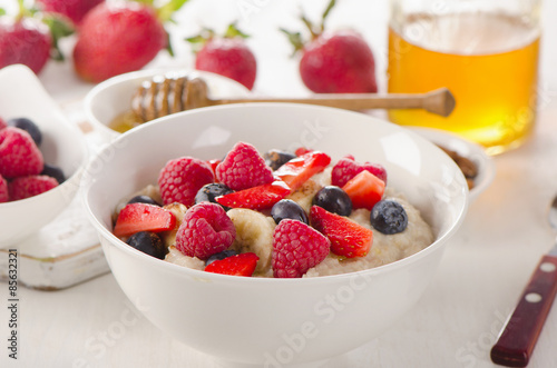 Oatmeal porridge with fresh Berries for  a Healthy Breakfast.