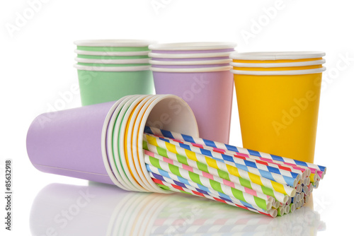 Multicolored retro straws in a paper cup