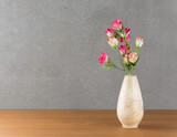 plastic rose in vase
