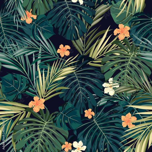 Bright colorful tropical seamless background with leaves and