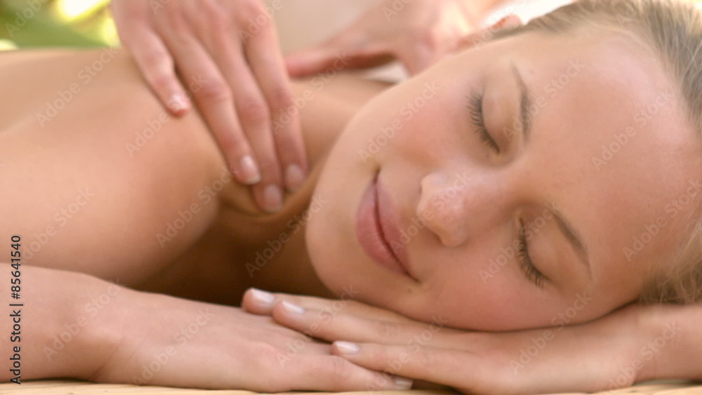 Woman enjoying a shoulder massage