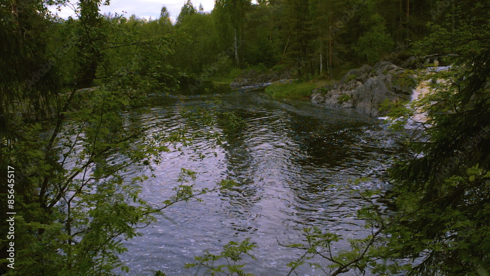 Mountain lake with small falls Mountain lake with small falls