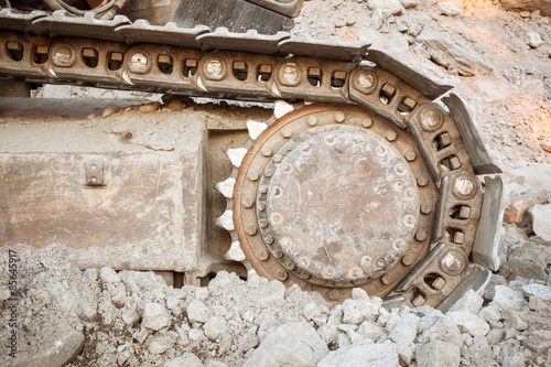 Well used excavator tracks closeup