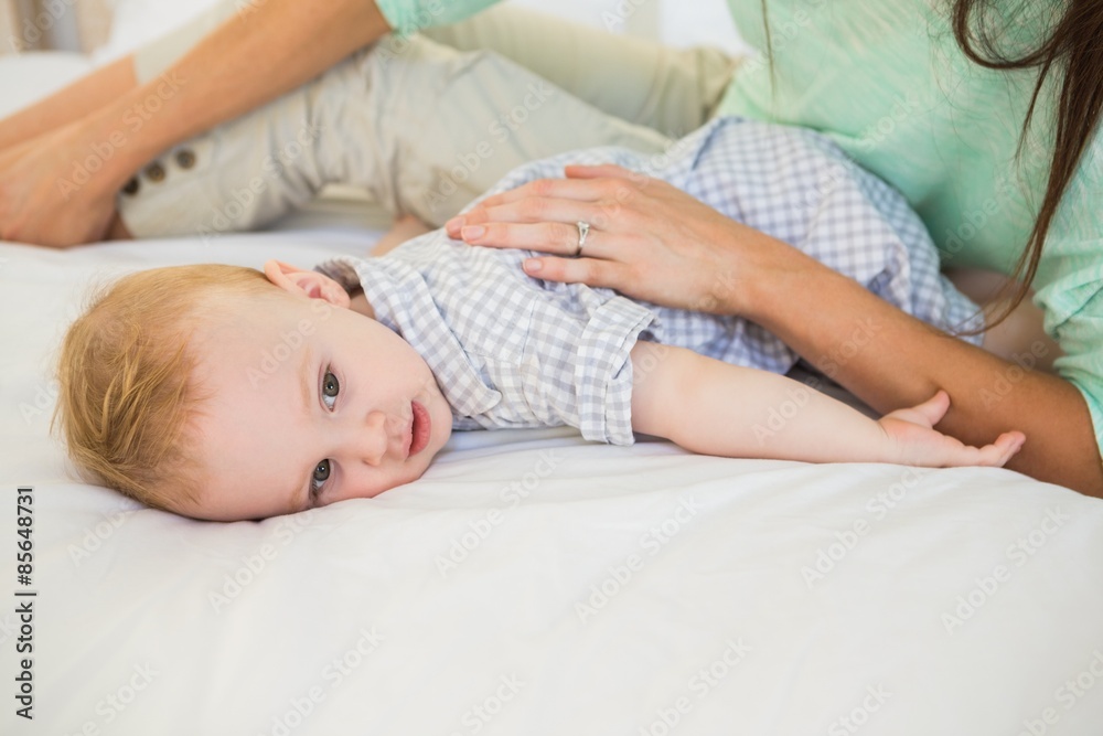 Happy mother with her baby boy 