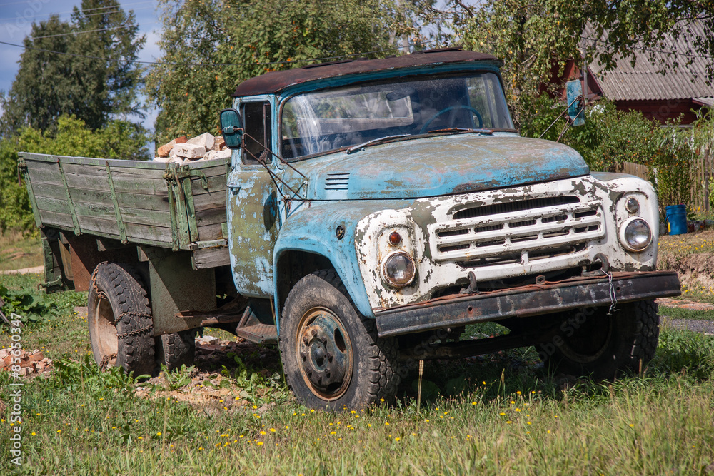 Old abandoned rusty grunge car