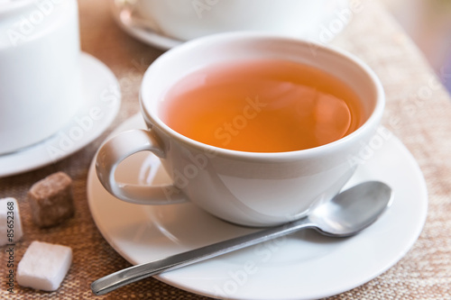 Cup of tea and tea pot