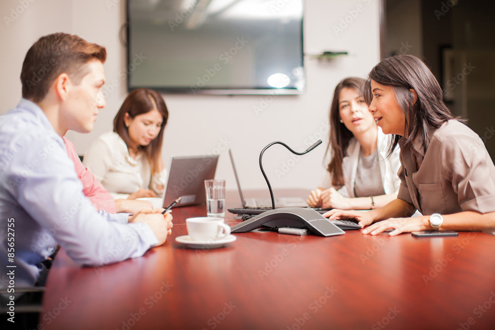 Group of business people on a conference call Group of business people on a conference call