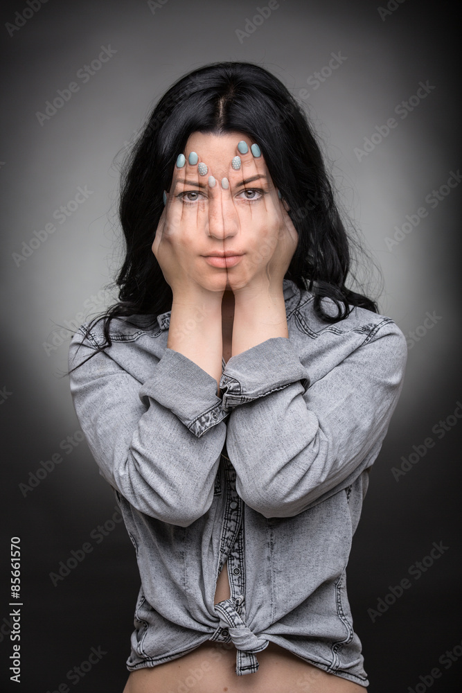 Multi exposure portrait of emotional brunette.