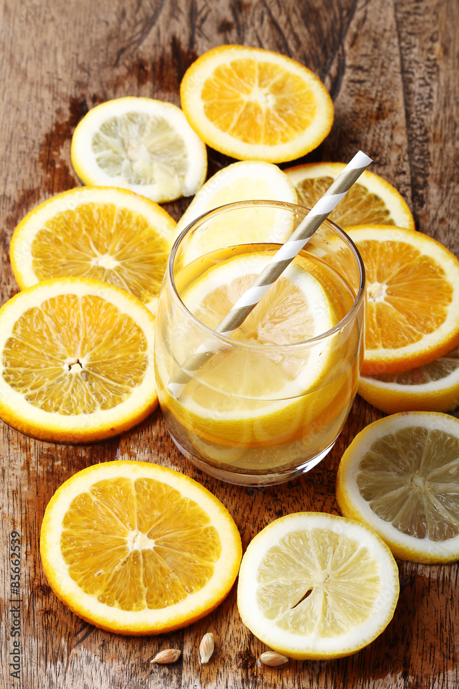 drink and stack of citrus fruits slices. drink and stack of citrus fruits slices.