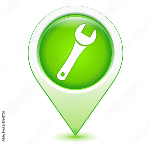 clef d'entretien sur marqueur géolocalisation vert
