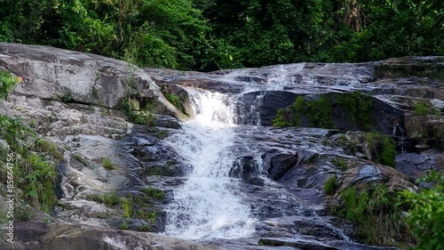 top area of Ton Pliw waterfall scene in the tropical forest of Trang, Thailand photo