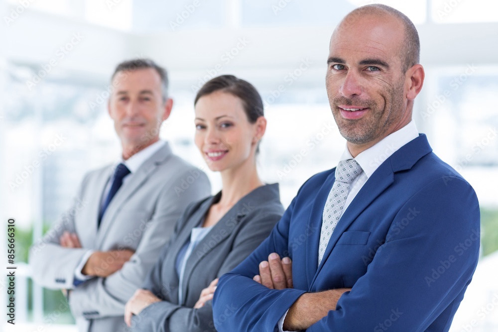 Business colleagues looking at camera Business colleagues looking at camera
