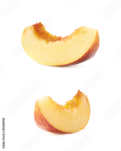 Slice of a nectarine isolated