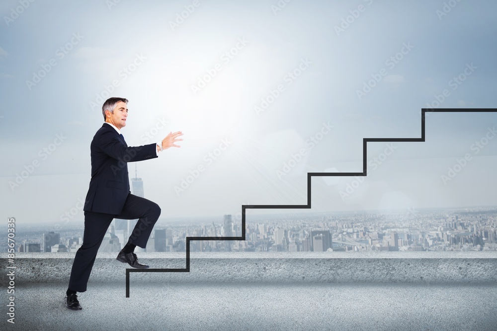 Fototapeta premium Composite image of businessman in suit posing with his arms out