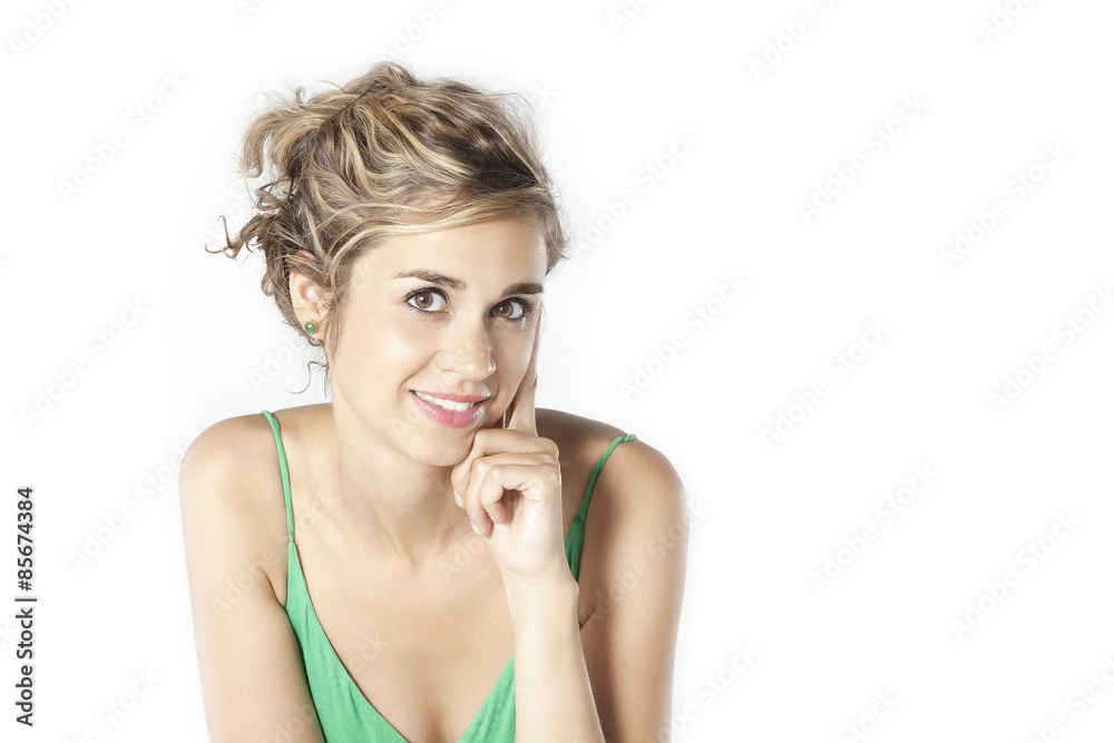 Portrait of young woman casual portrait in positive view, big smile, beautiful model posing in studio over white background, green dressed . Isolated on white. Portrait of young woman casual portrait in positive view, big smile, beautiful model posing in studio over white background, green dressed . Isolated on white.
