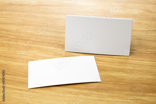 Blank Business card mock up on light wooden table, Business corp