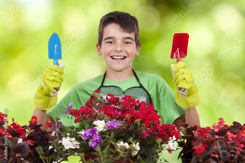 young with flowers, gardening and garden plants photo