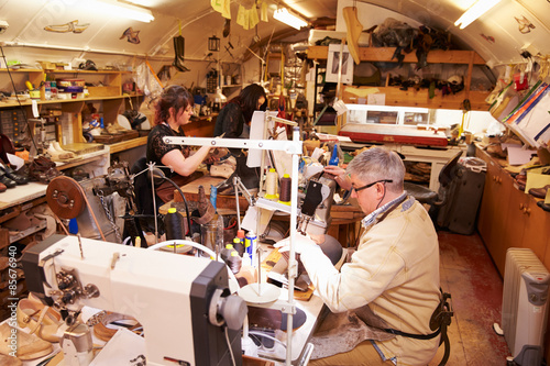 Shoemakers working in a workshop, general view © Monkey Business