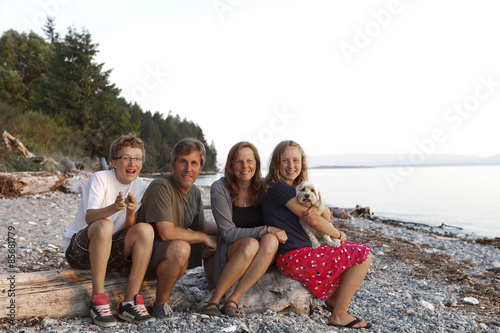 Family portrait on a rocky coastal beach