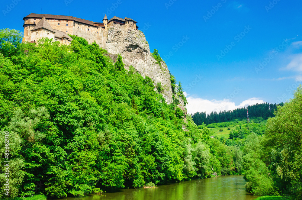 Orava Castle background of green trees, Slovakia