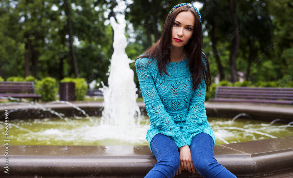 The woman with the hair and jeans which became wet from a rain The woman with the hair and jeans which became wet from a rain