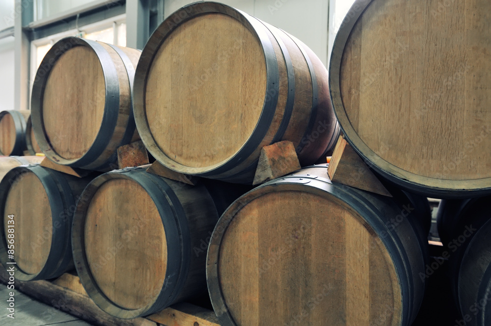 Wine barrels in an aging process