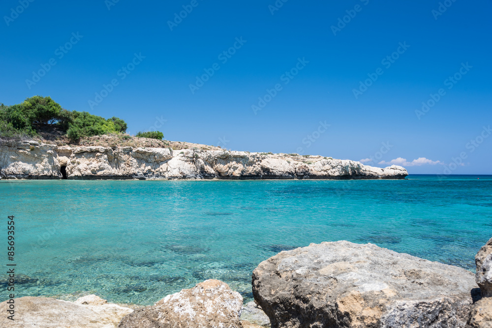 Fototapeta premium Crystal clear waters and sandstone rocks of the Mediterranean Se