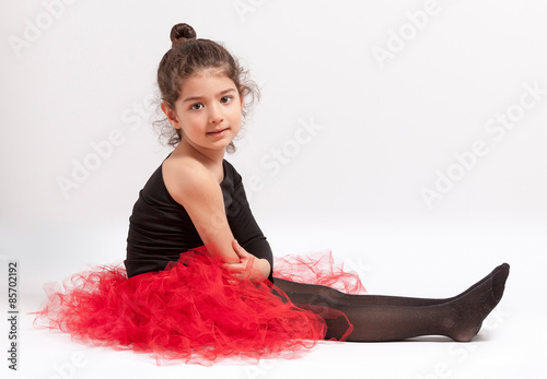 A Child Dance Performer sitting photo