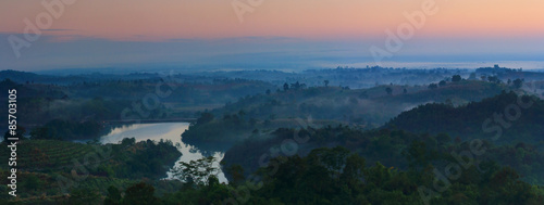 Colorful autumn panorama of the mountains. Sunrise