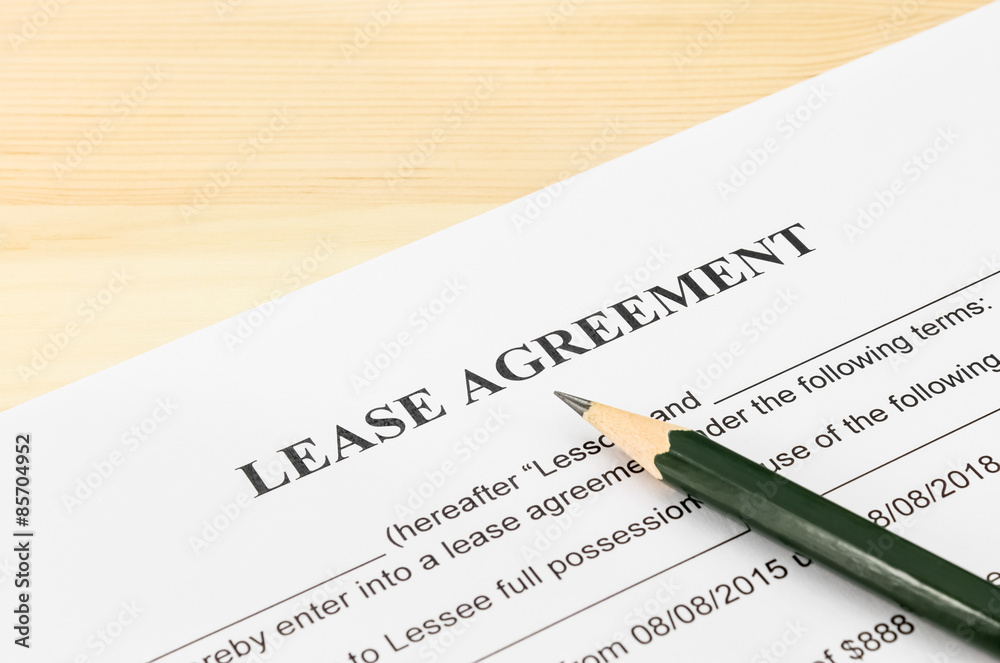 Lease Agreement Contract Document and Pencil at Bottom Right Cor Lease Agreement Contract Document and Pencil at Bottom Right Cor