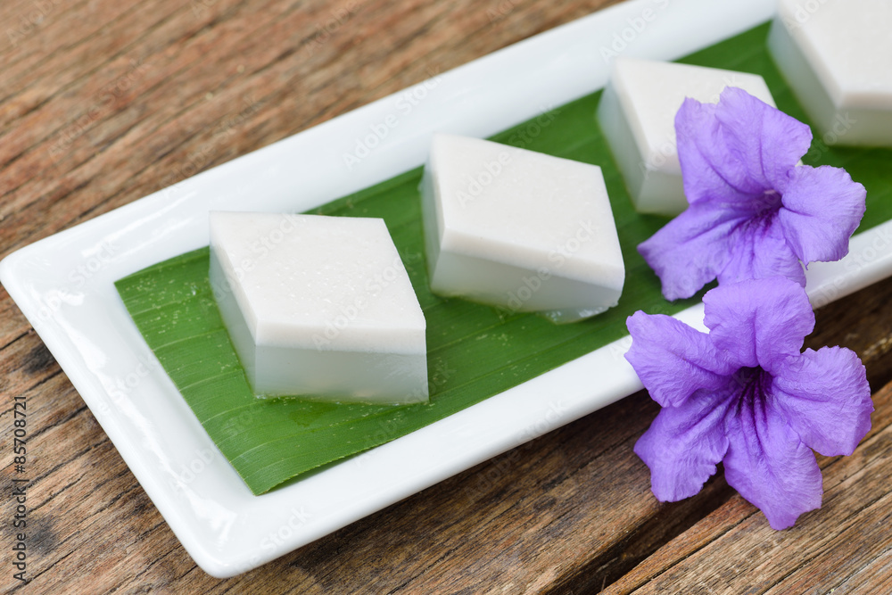 coconut jelly, thai dessert on old wood background.