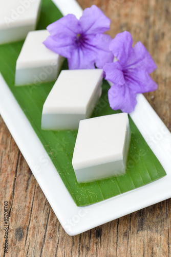 coconut jelly, thai dessert on old wood background.