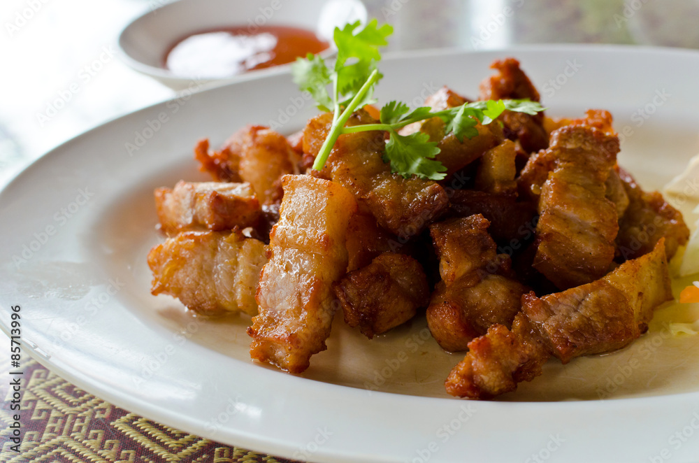 Fried pork belly with fish sauce, Thai recipe. Fried pork belly with fish sauce, Thai recipe.
