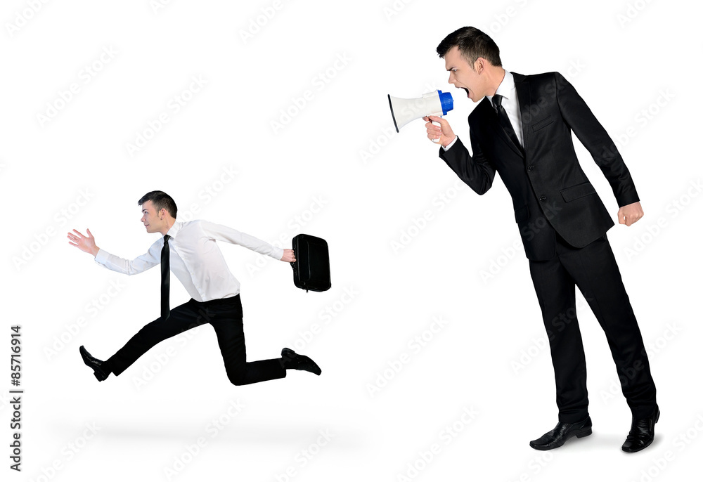 Business man screaming on megaphone Business man screaming on megaphone