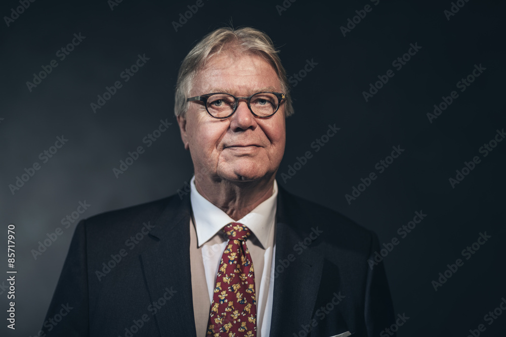 Friendly confident businessman wearing glasses Friendly confident businessman wearing glasses