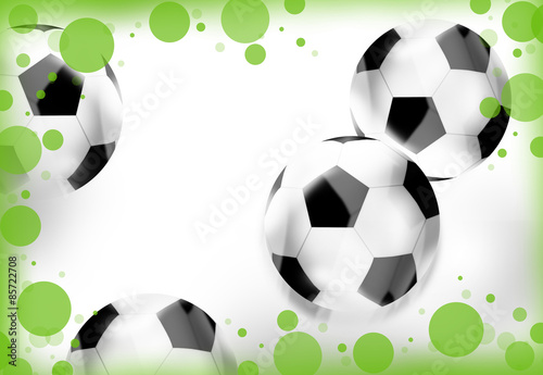 white soccer balls green dots grass