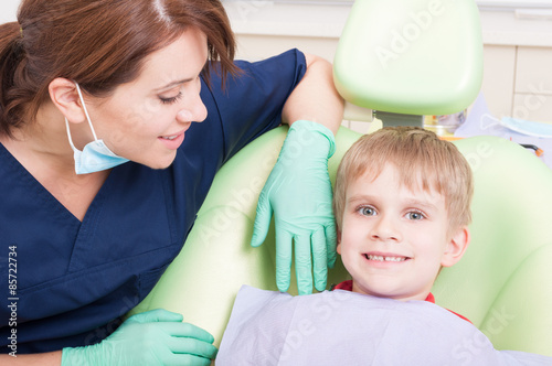 Happy and smiling kid at dentist with no fear